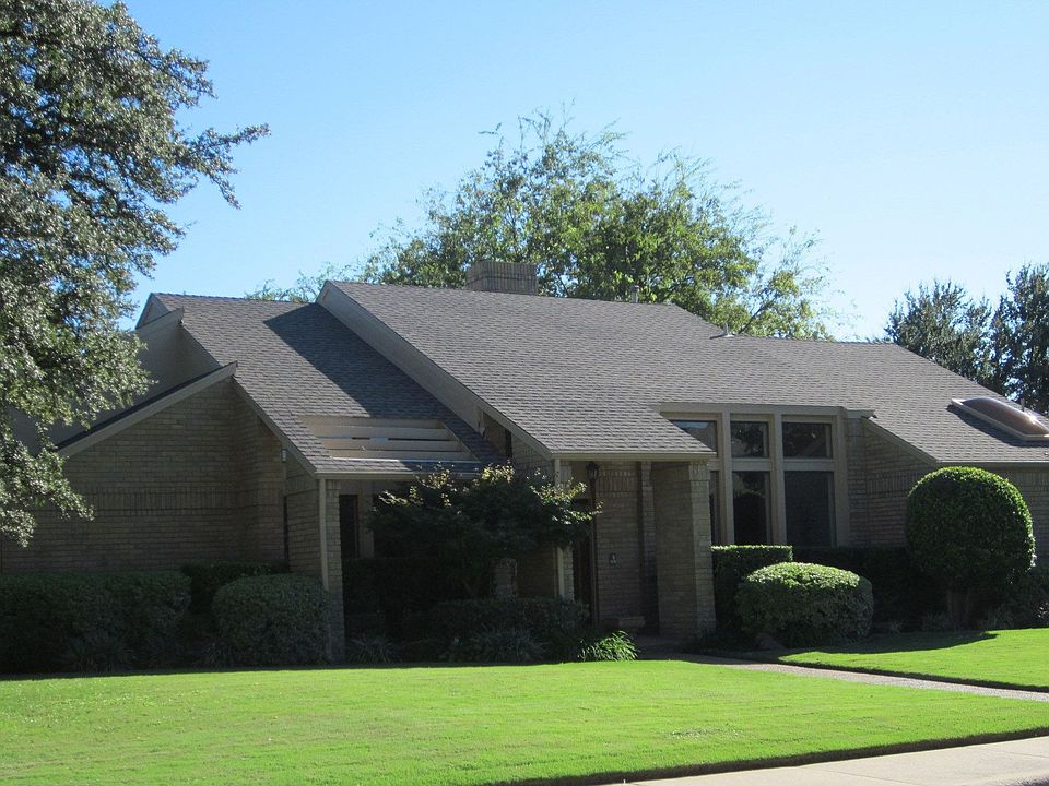 Immaculately maintained home and yard with mature trees