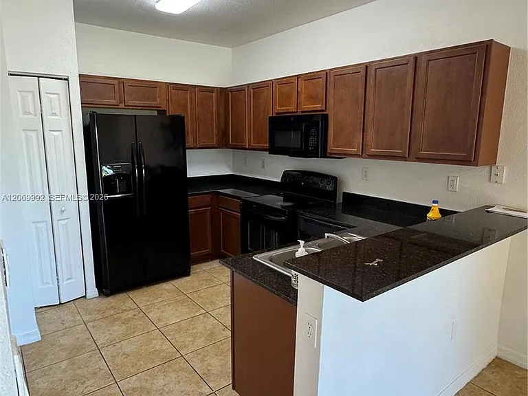 10870 NW 88th Ter #208 — Photo 3