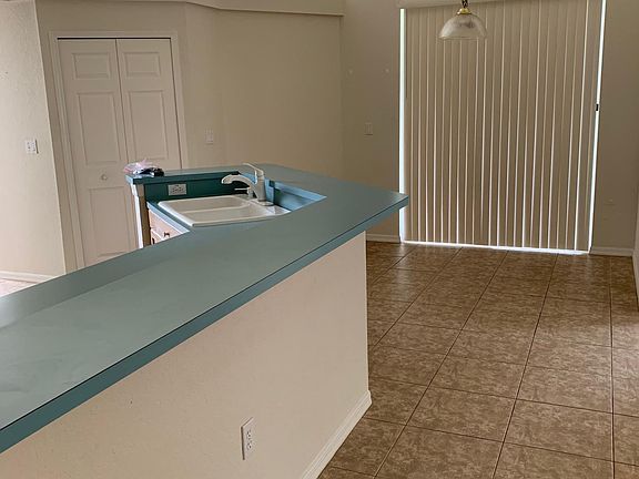 Nice sized pantry. Long breakfast bar. Kitchen dining nook.