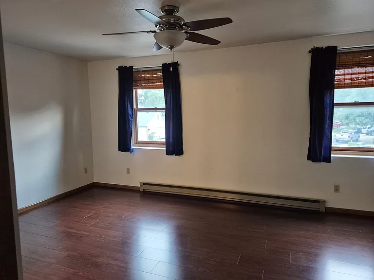 Master bedroom shown with white walls, which is how it currently looks