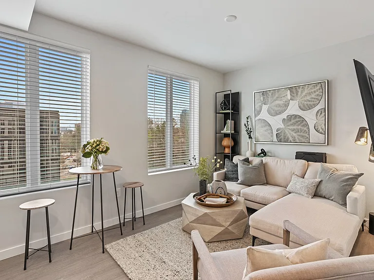 Spacious living room with large windows