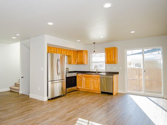 Open living room, dining room and kitchen