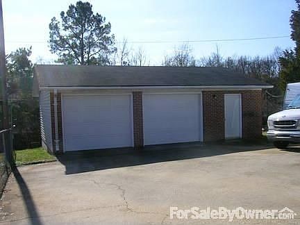 Detached 2 car garage w/ finished shop.
						:
						Shop is finished, insulated and wired with 220 service. 32' x 22'