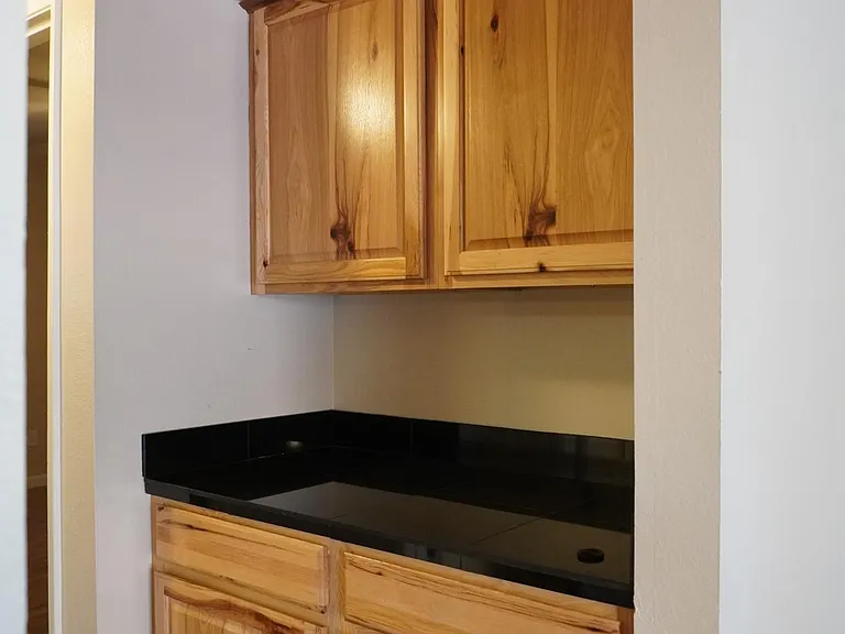 Hallway cabinets in hallway.