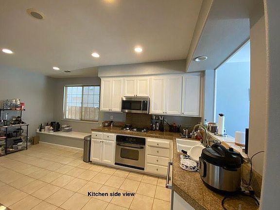 5th image of 5728 Old Westbury Way