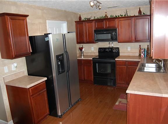 Upgraded Kitchen Features Hardwoods, Upgraded Cabinets & Counters