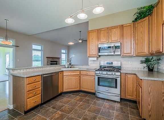 Gorgeous silestone countertops, stainless steel appliances and ample cabinetry.