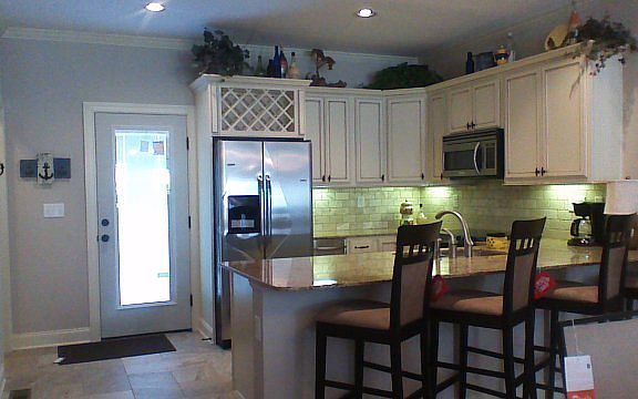 Kitchen : Looking into kitchen and front door from Great room.
