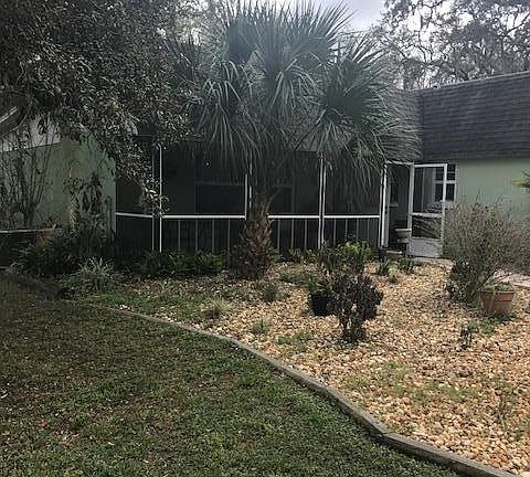 beautiful yard over an acre