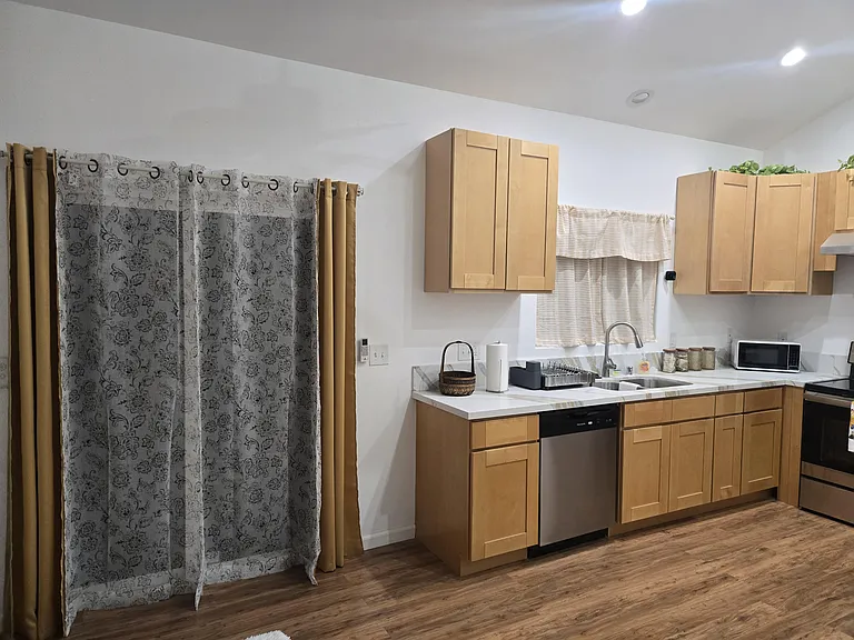 Sliding patio door off of living room/kitchen area
