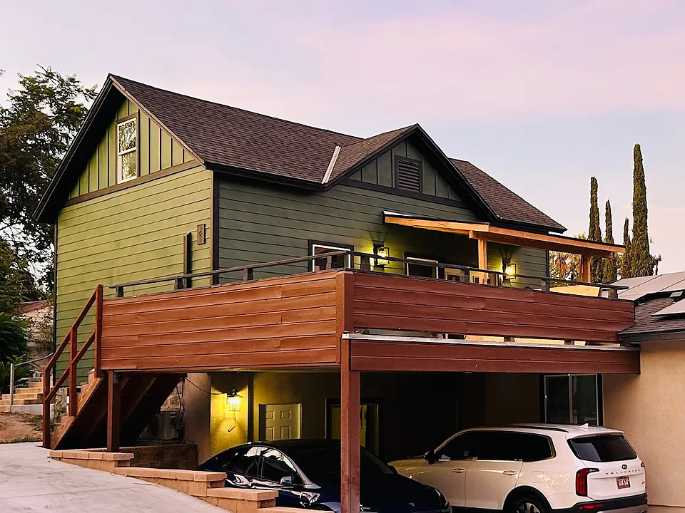 Home is on 2nd story with huge private deck in front and private fenced yard in rear.