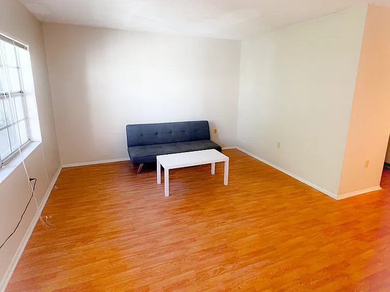 Unit is unfurnished and photos are staged. Furniture not included.