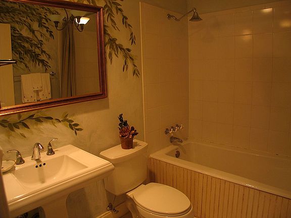 down bath w/porcelain soaking tub & tile