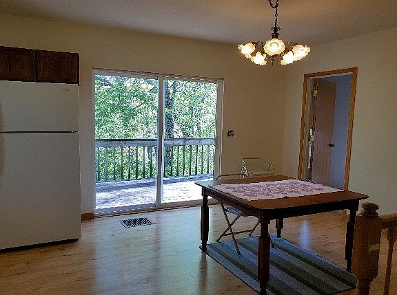 Kitchen with slider to deck