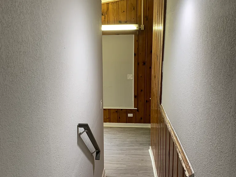 Stairway to living room and bedroom #2