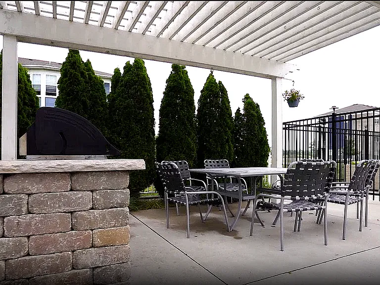 Grill, gather, and dine under the pergola_it's all right here.