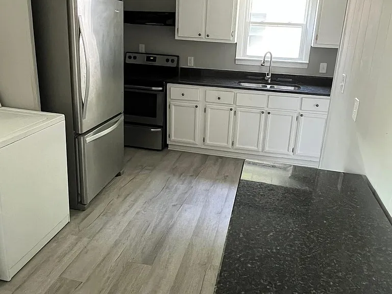 Kitchen with newly-installed granite countertops