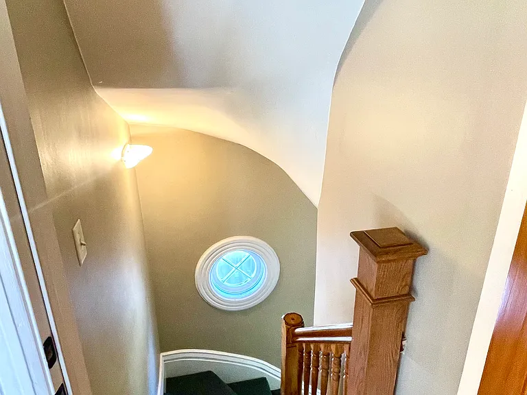 Upper front door to front stairway.