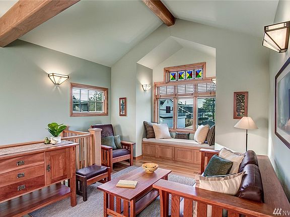 Second floor family room off kitchen. Beamed ceiling, quarter sawn white oak floors,built in window seat!