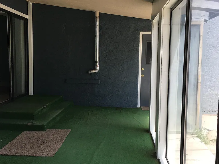 Huge sunroom right next to the laundry room