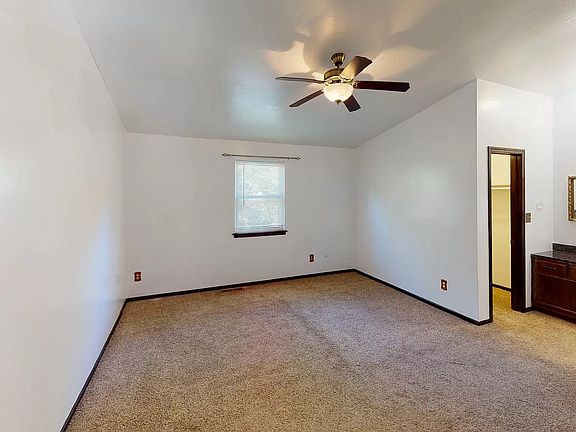 Master bedroom upstairs with a large walk in closet and ensuite bathroom.