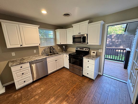 Remodeled kitchen with granite countertops and new cabinets