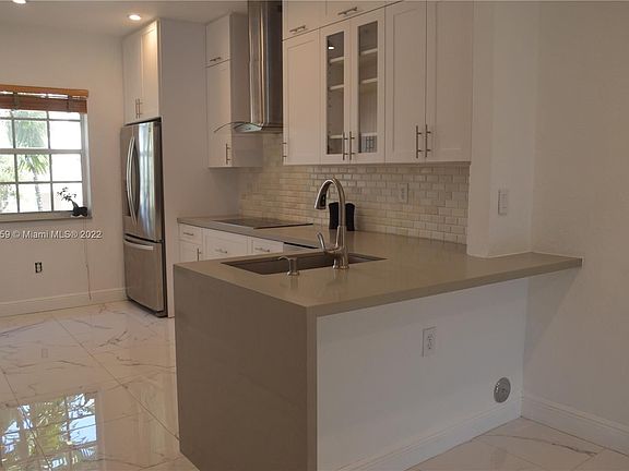 4th image of 5620 NW 114th Path APT 211