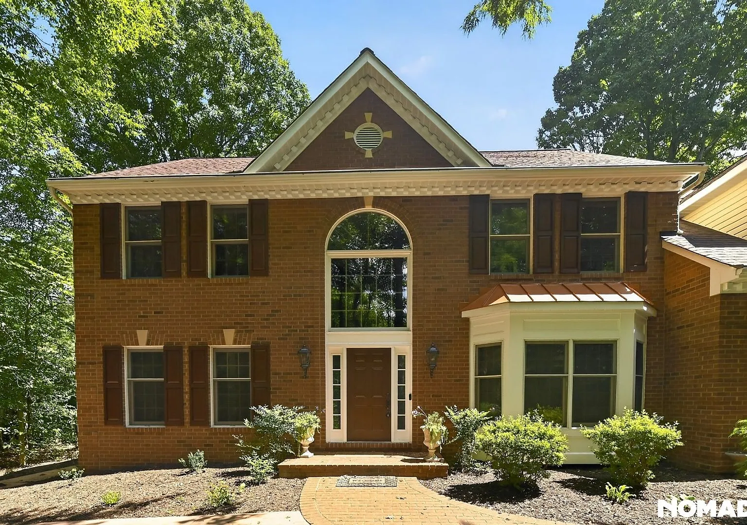 "House on a Hill" Blends Convenience and Wooded Retreat — Photo 2