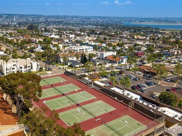 5 tennis courts on top of parking garage (1 space allocated to this unit)