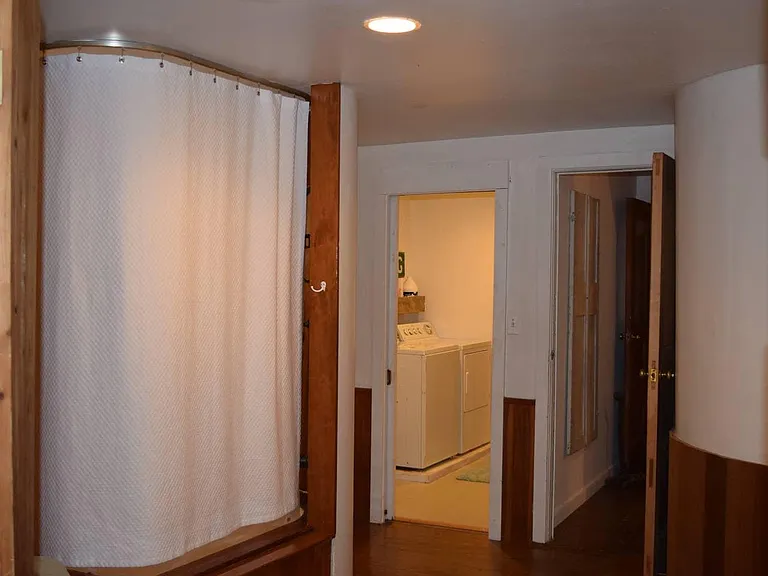 Main Floor Bathroom Tub + Shower