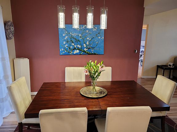Bright, inviting dining area with natural light and modern charm_perfect for everyday meals or entertaining guests.
