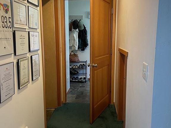 From bedroom to hall to upstairs. Bath on left