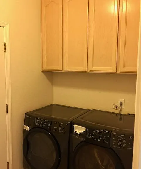 Laundry room comes with washer and dryer.