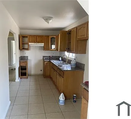 10026 S San Pedro St — Photo 6