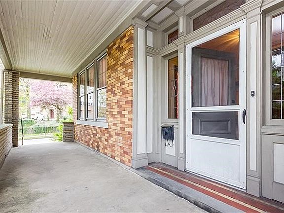 Long, private, covered front porch