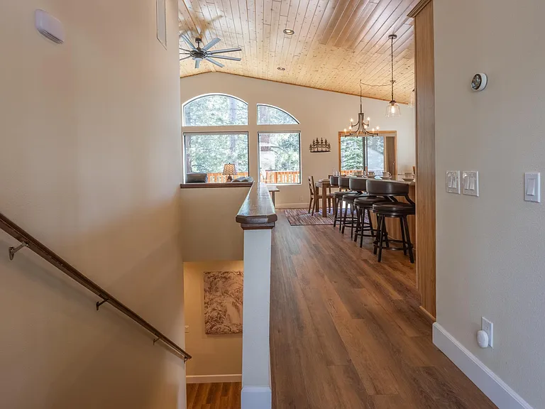 Stairs go down to bedrooms