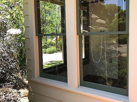 adjacent to front entry