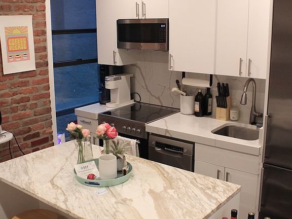 2nd image of 280 E 10th St APT 2A