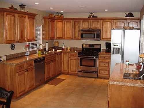 KItchen with Custom Built Cabenits and Stainless Steel Appliances