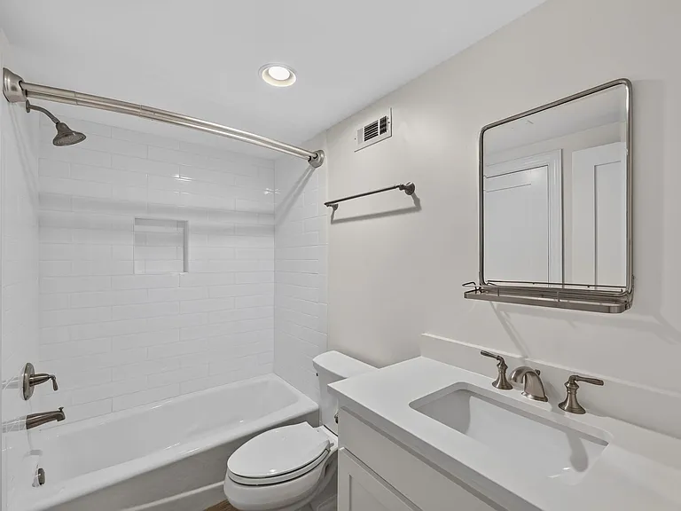 Full basement bathroom with access inside the basement bedroom or to the hall.