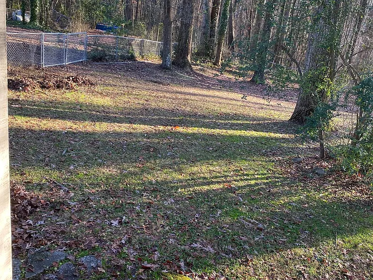 From the rear entrance to home office, fenced backyard. Landlord responsible for grounds maintenance