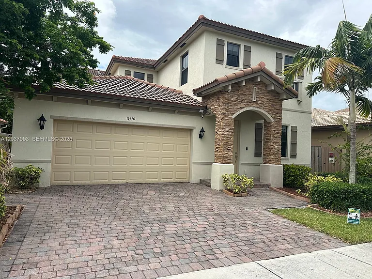 11770 SW 242nd Ter #200 — Photo 1