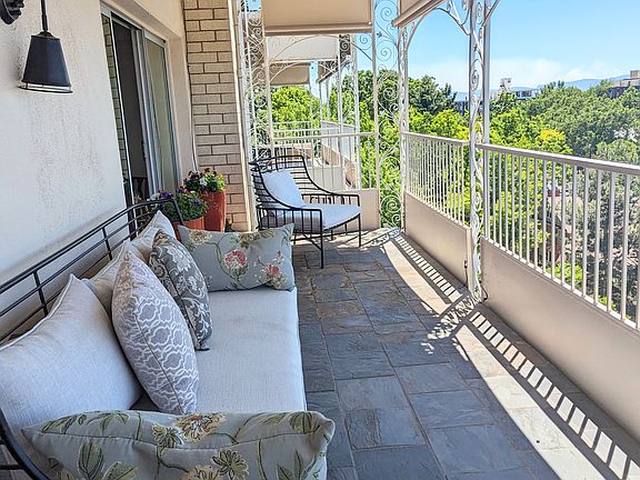 24ft west facing balcony with furniture and planters that stay!