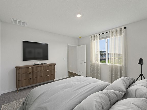 The Everglade Primary Bedroom Virtually Staged.