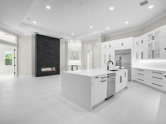 Kitchen to Great Room Oceanic Grande Move-in Ready shown for reference