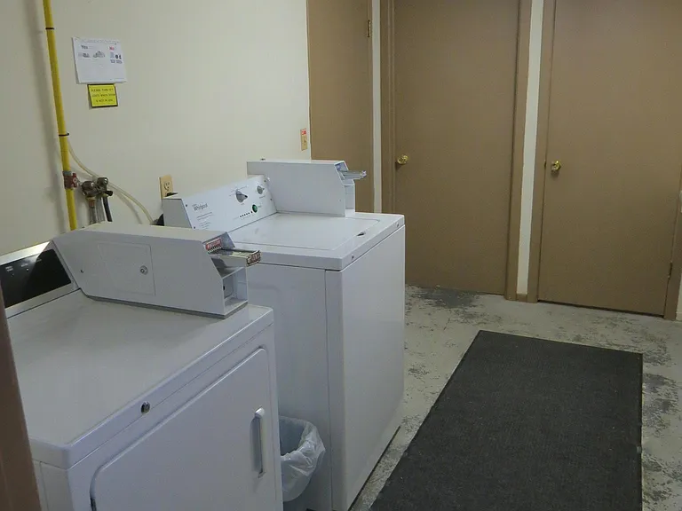 Shared laundry room in basement