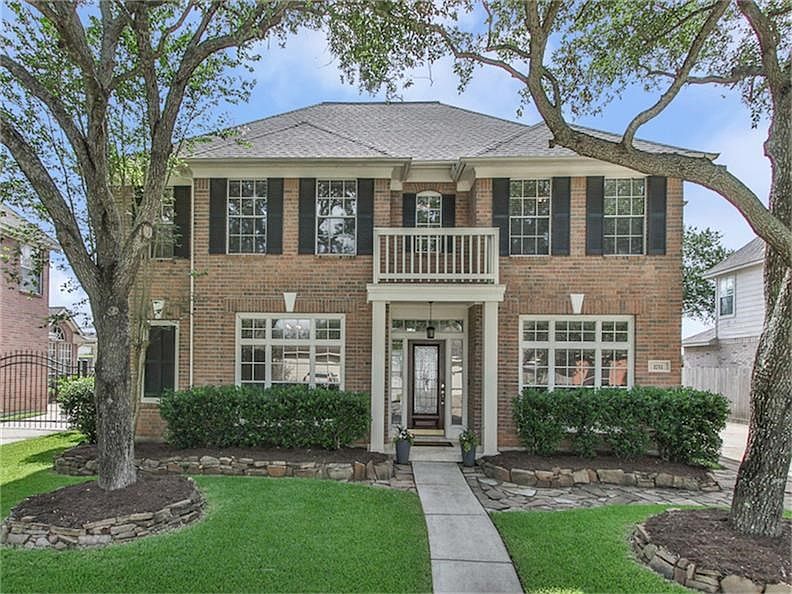 Gorgeous home on street lined with mature trees