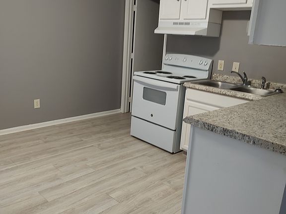 Spacious eat in kitchen, with a laundry room just off the kitchen