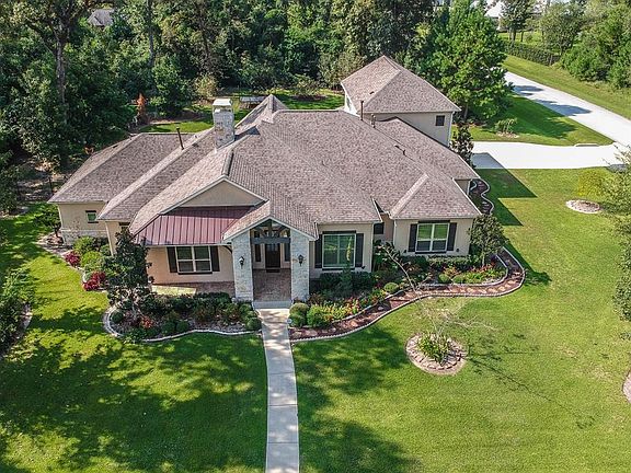 5350 Pine Wood Hills Ct is ideally situated for afternoon entertaining in the backyard. The 1.03 acres, allows You and your guests to relax in a private setting