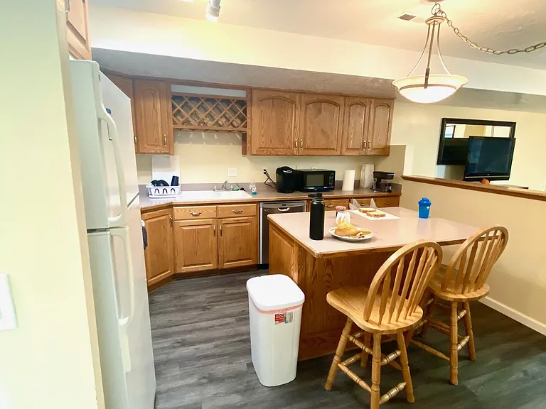 Updated kitchen with modern finishes, skylight, and plenty of cabinet space _ perfect for everyday meals or entertaining.